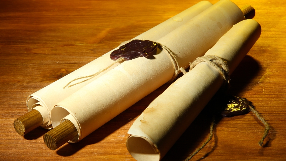 A certificate scroll symbolizing accreditation.